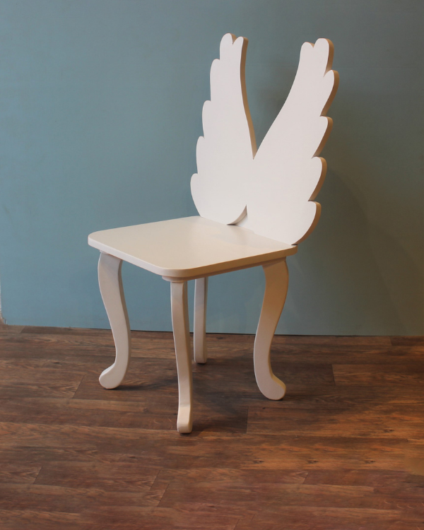 White wing-shaped kids chair for study and reading