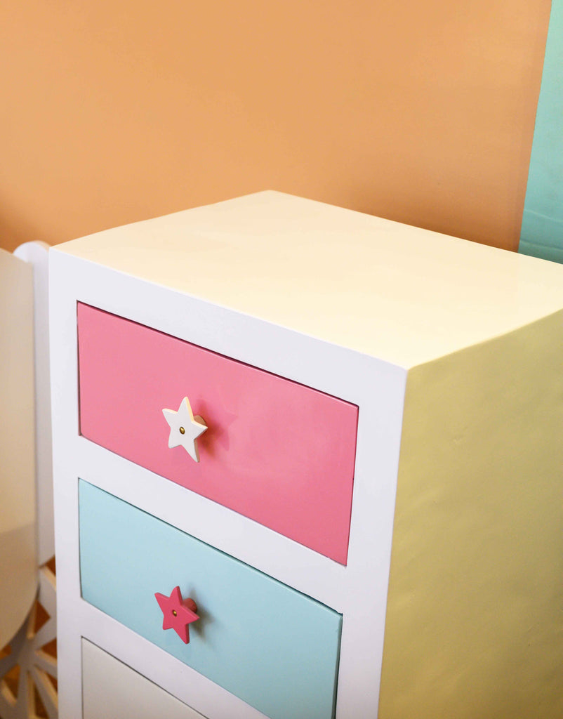 Star knobs add a whimsical touch to the design