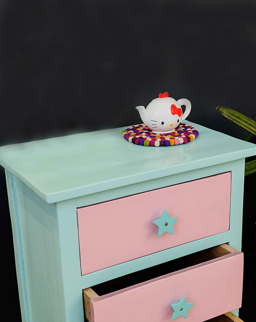 Hand-painted mint green and pink color combination on wooden chest