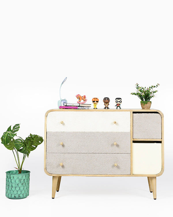 Modern dresser with fabric drawers and yellow cabinet