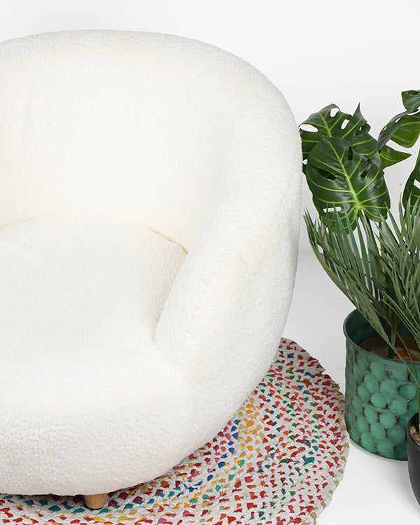 Wooden legs chair with soft textured upholstery