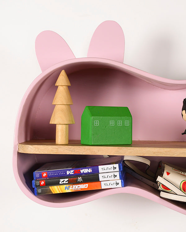 Child-safe pink wall shelf with rounded edges