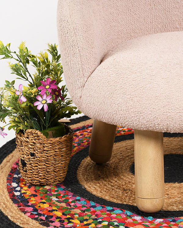 Comfortable kids pink lounge chair with rounded design