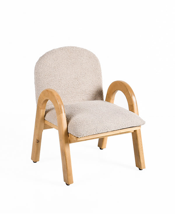 Stylish kids chair with rounded grey upholstery