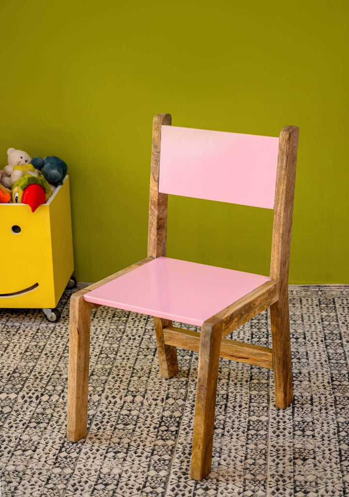 Cute pink chair with natural wood legs