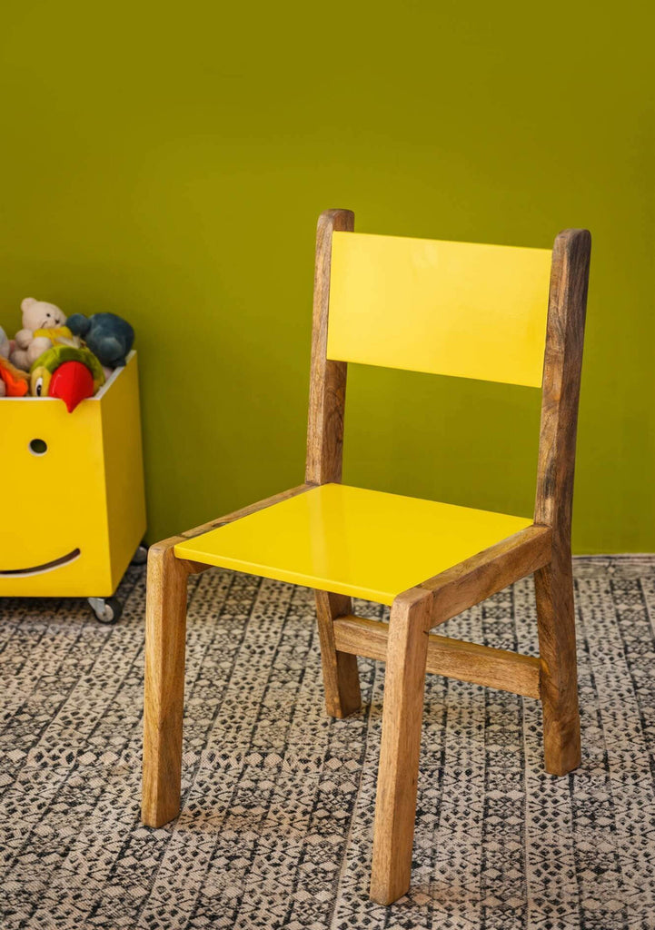 Charming yellow chair with natural wood legs