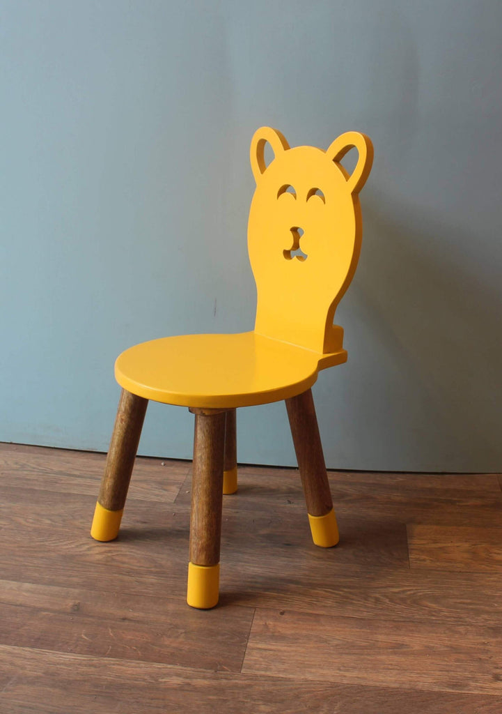 Pink and yellow rabbit-shaped chairs