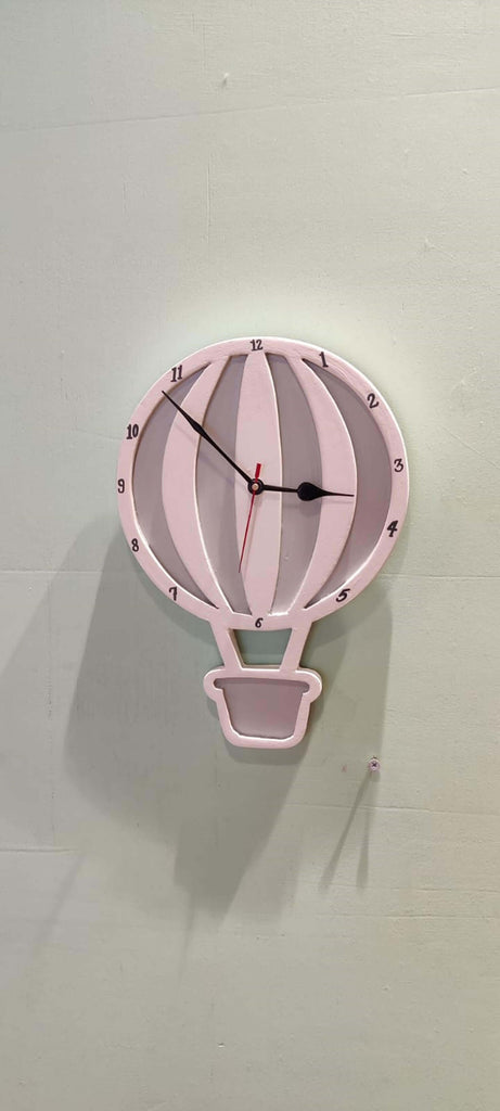 Analog dial with 3D cut-out numbers for easy time reading - whimsical clock design