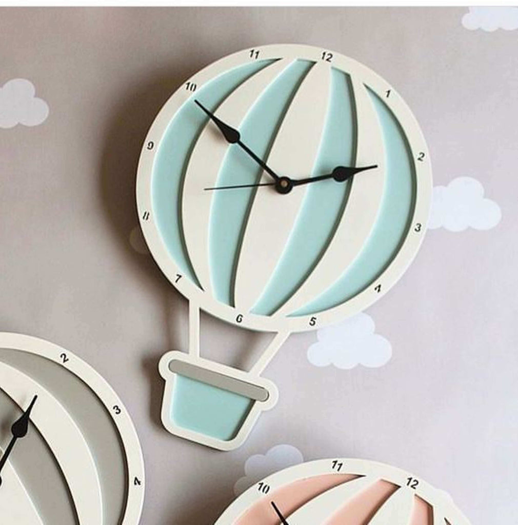 Whimsical and decorative addition to nurseries and kids' rooms - cute wall clock